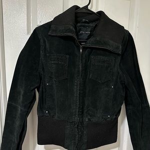 This is a black denim jacket, it has 4 functioning pockets and zipper!